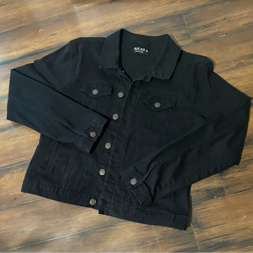 Black Denim jacket.  Size XL, but fits more like a medium. Lightweight denim.